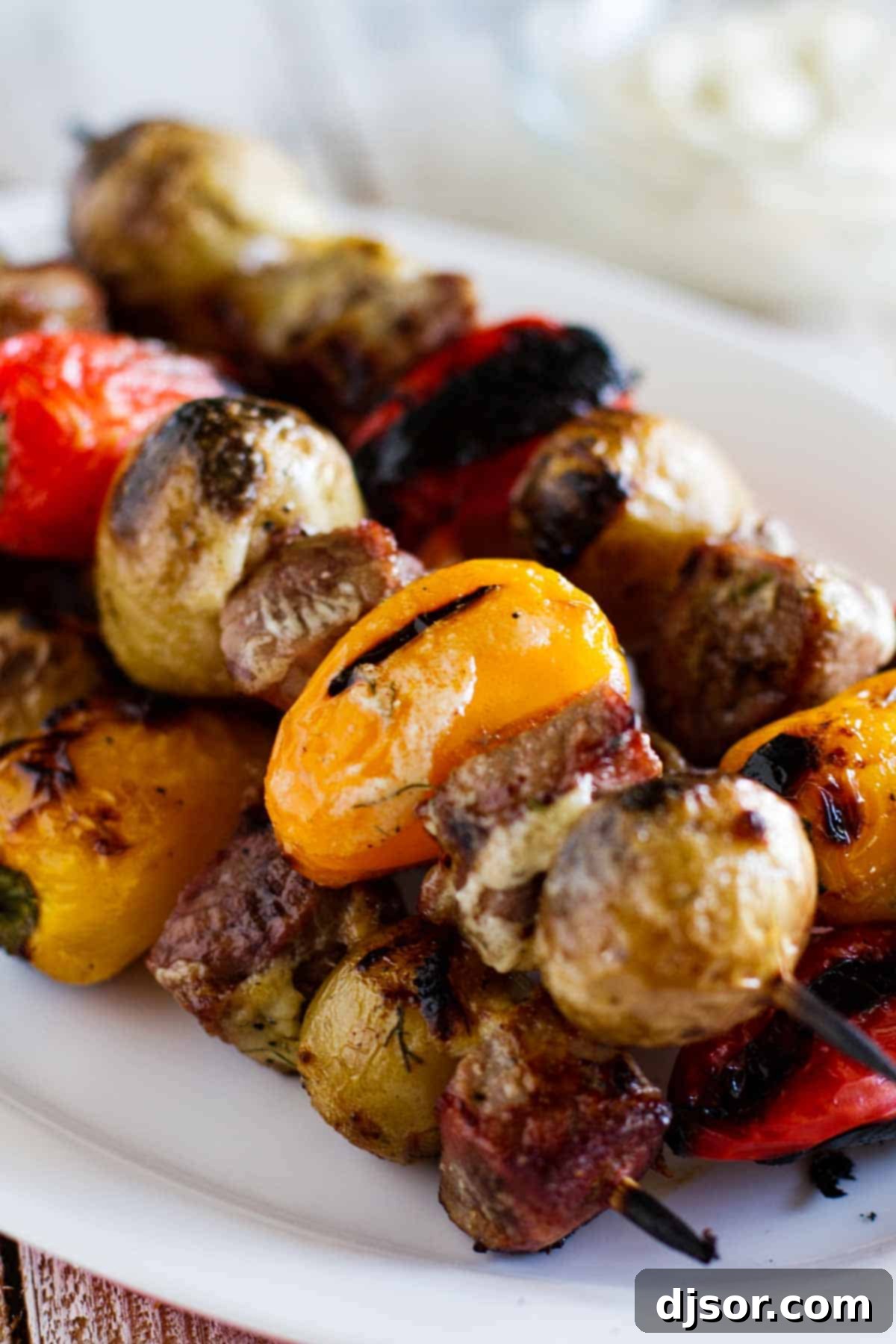 A close-up view of beautifully grilled Steak and Potato Kabobs, showcasing the charred edges and juicy ingredients.