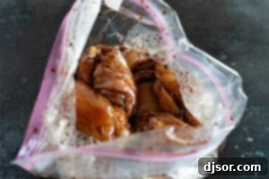 Sticky Honey Soy Glazed Chicken 8 Marinating chicken thighs in a honey soy marinade.