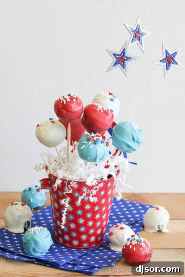 Fourth of July Red and Blue Velvet Cake Pops 2 Vibrant Red and Blue Velvet Cake Pops arranged perfectly for a 4th of July celebration