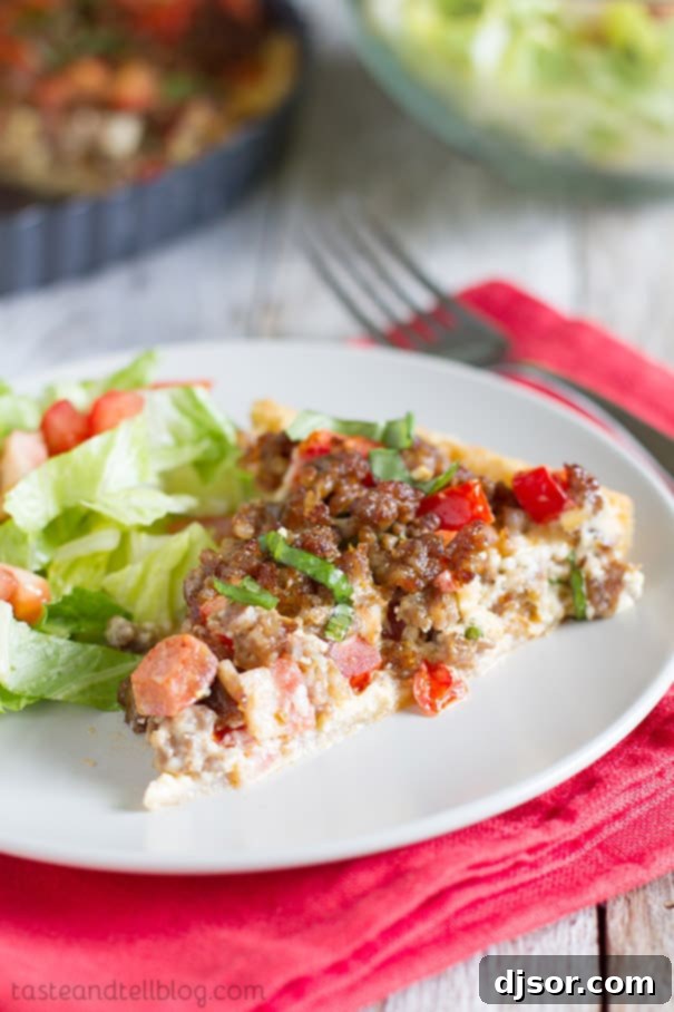 A freshly baked Savory Italian Tart, still in its tart pan, with a golden-brown crust and a rich, bubbly filling, ready to be cooled and served.