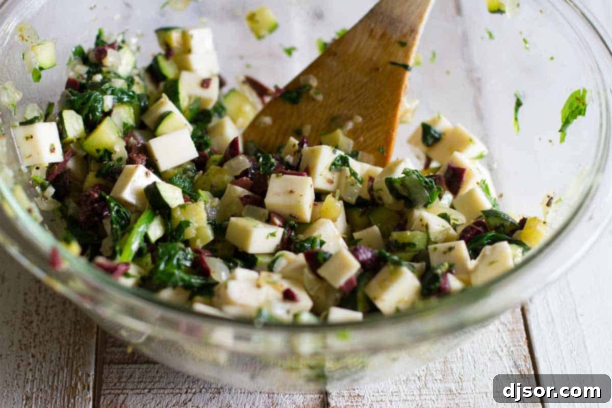 Close-up of the delicious filling for Italian stuffed tomatoes, rich with vegetables and cheese.