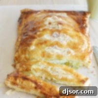 Puff Pastry Potato Pie cut into slices.