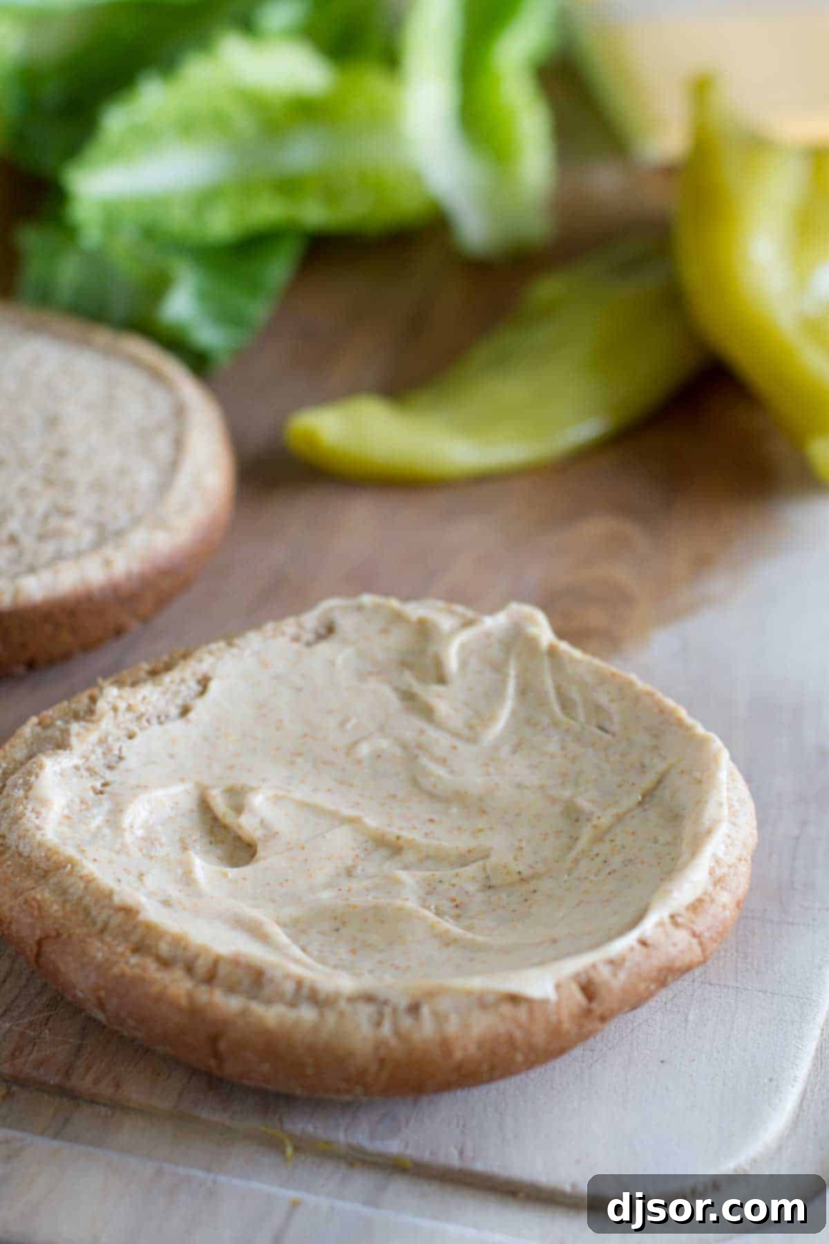 Homemade Santa Fe Sauce for Grilled Chicken Sandwich - Close-up of creamy, spiced mayonnaise sauce with paprika, curry, and cayenne.