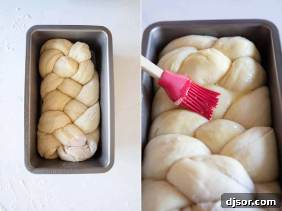 A beautifully braided brioche loaf nestled in a standard baking pan, perfectly risen and ready for the oven.