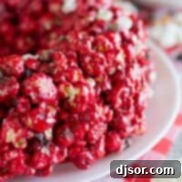 Decadent Red Velvet Popcorn Cake 4 Red Velvet Popcorn Cake on a plate.