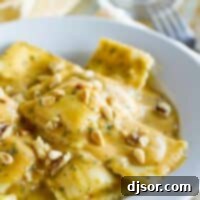 Pumpkin Ravioli Perfection 2 ravioli in a bowl topped with pumpkin pasta sauce