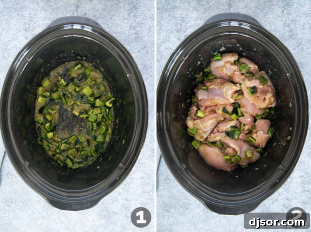Adding ingredients to slow cooker for Slow Cooker Chicken Tacos, showing the chicken nestled in the tomatillo and pepper mixture.