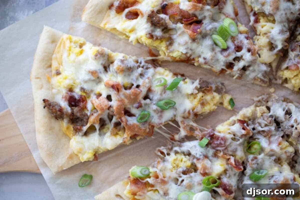 Customizable Breakfast Pizza Overhead view of breakfast pizza, garnished and ready to be sliced, highlighting its colorful toppings.