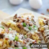 Sunrise Slice 2 Sliced Breakfast Pizza on parchment paper, ready to serve.