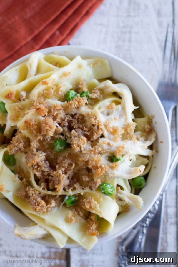 Large dish of Garlic Parmesan Chicken Pasta topped with golden breadcrumbs
