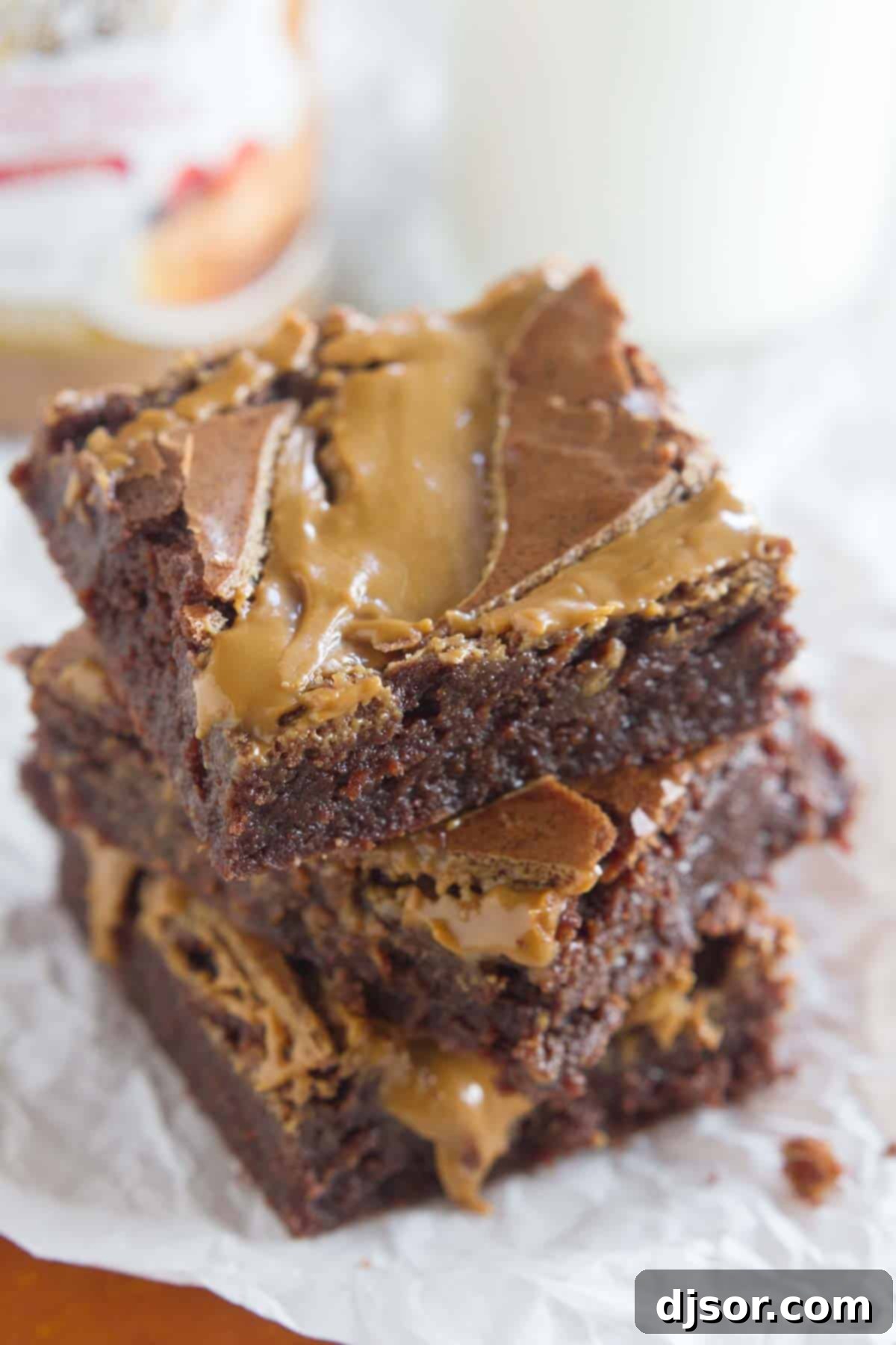 Lotus Biscoff Brownie Delight 6 A stack of delicious Biscoff brownies, showing their thickness and fudginess.