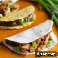 Honey Garlic Chicken Tacos made with soft and hard tortillas.