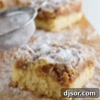 This Crumb Cake Recipe has a moist cake that is topped with a thick layer of crumb topping. This is the BEST crumb cake recipe!