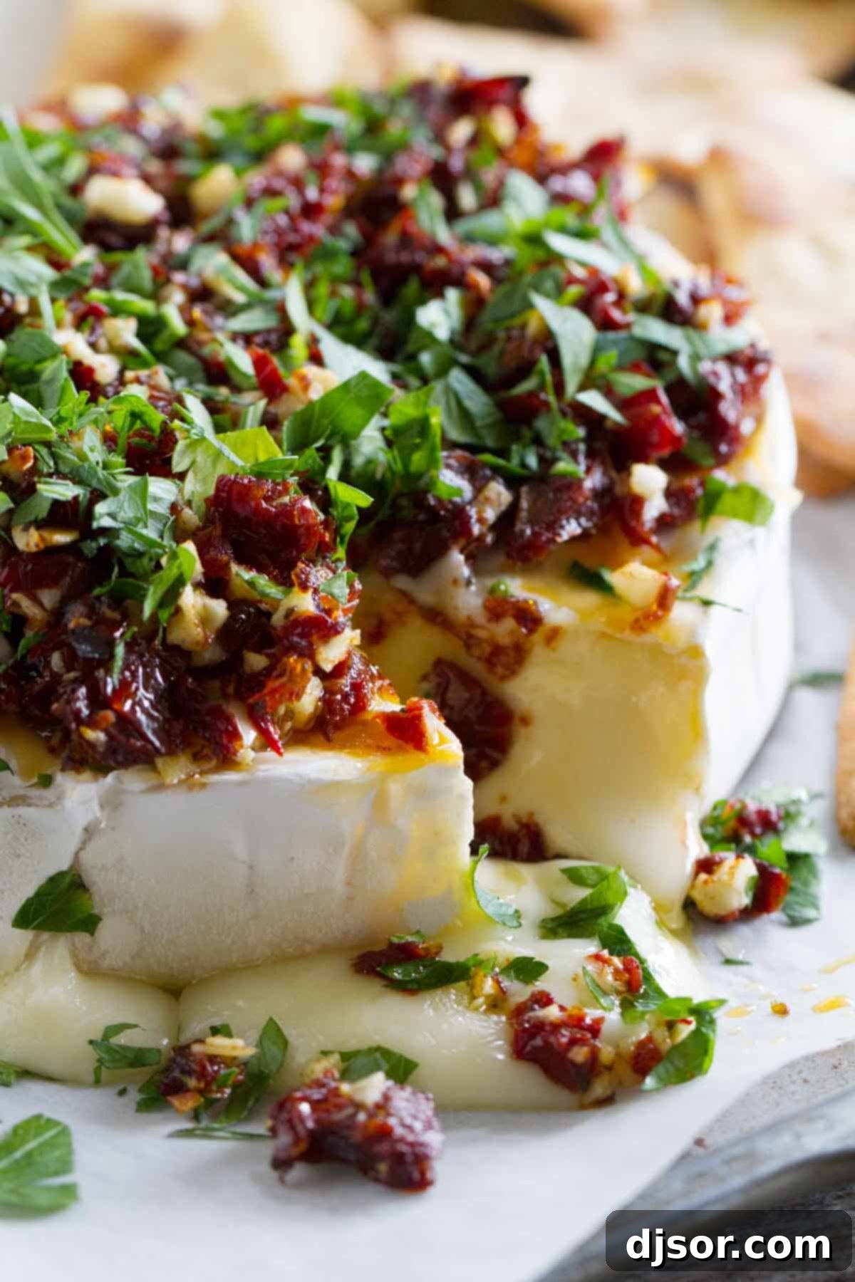 Baked Brie with Sun-Dried Tomatoes: A simple yet elegant appetizer Easy Baked Brie Recipe with Sun-Dried Tomatoes, perfect for any gathering.