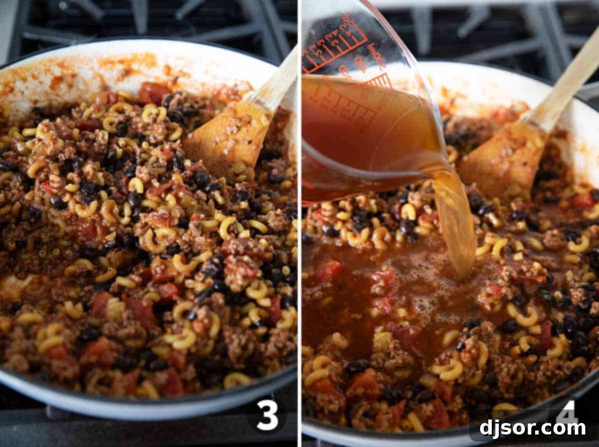 A large pot filled with browned ground beef, spices, and a mix of beans, tomatoes, and dry pasta, ready for beef broth to be added for Chili Mac.