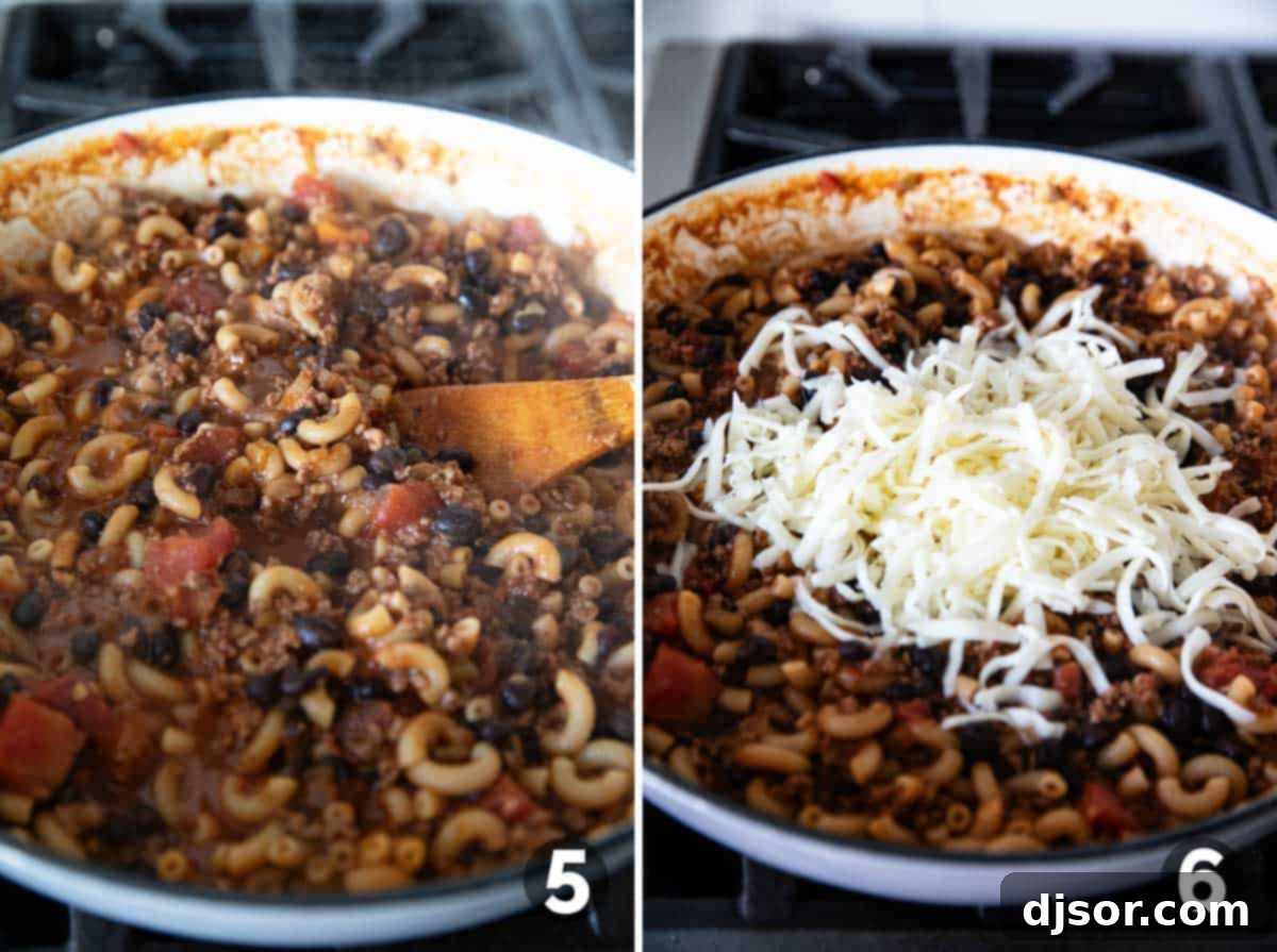 Chili Mac simmering in a pot with pasta tender, before the final addition of cheese to melt into the dish.