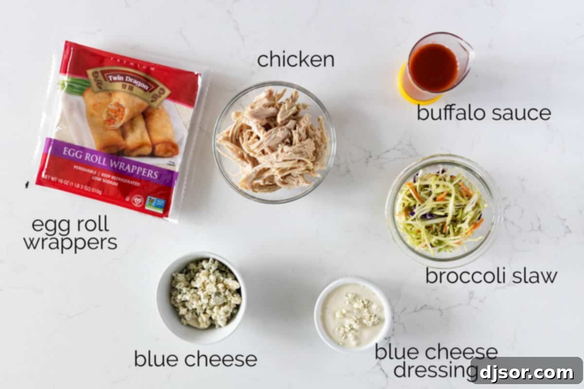 Perfect for a game day appetizer or meal, these Buffalo Chicken Egg Rolls have crisp outer shells that are filled with chicken, hot sauce, blue cheese, and slaw. Ingredients to make buffalo chicken egg rolls.