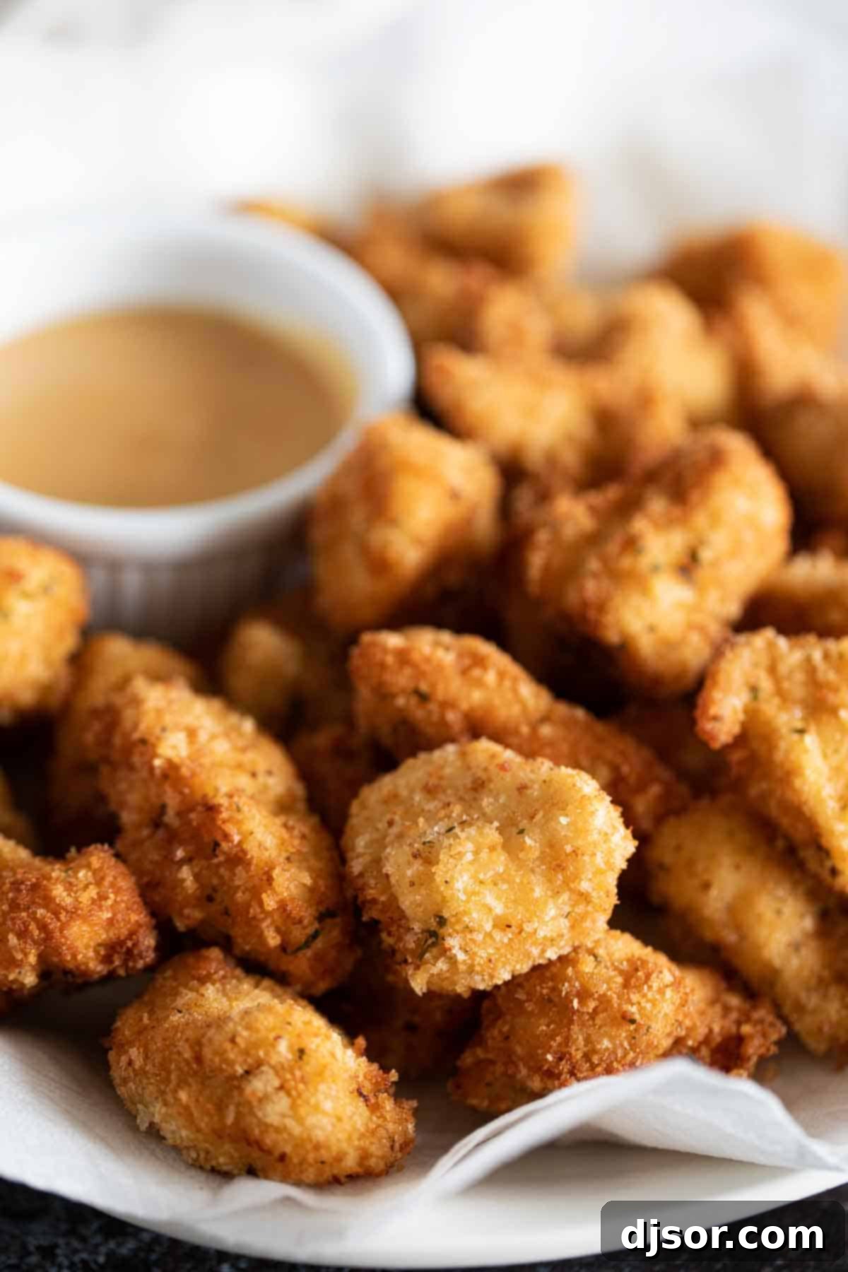 plate with Homemade Chicken Nuggets with chick fil a sauce ready to eat