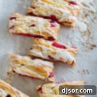 Decadent Red Velvet Cream Cheese Danish 7 Red Velvet Cream Cheese Danish cut into slices.