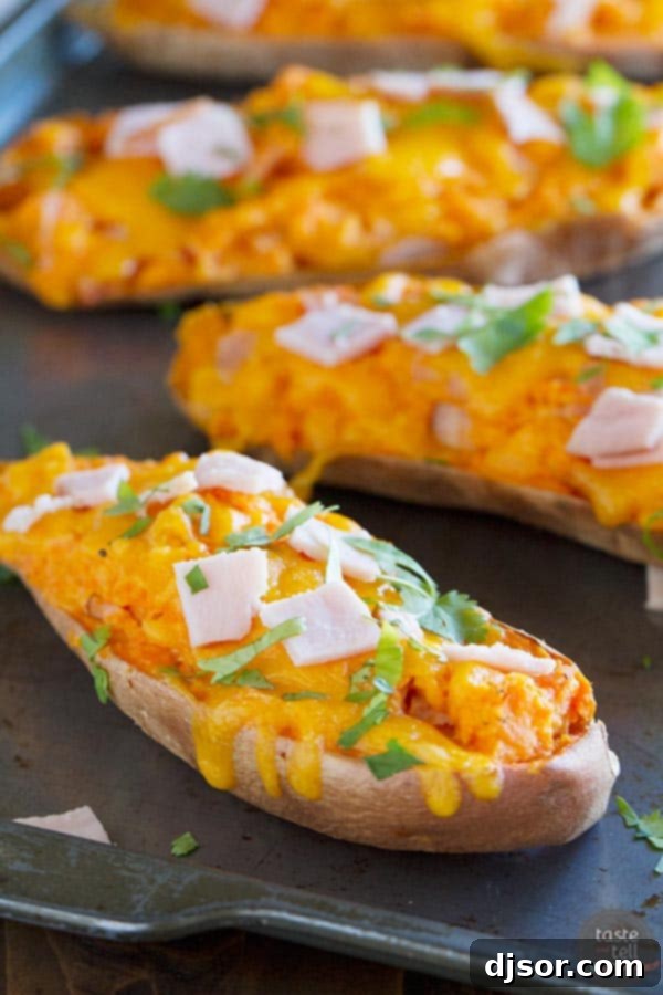 Delicious Twice Baked Sweet Potatoes with Cheddar and Canadian Bacon, perfect for any meal.