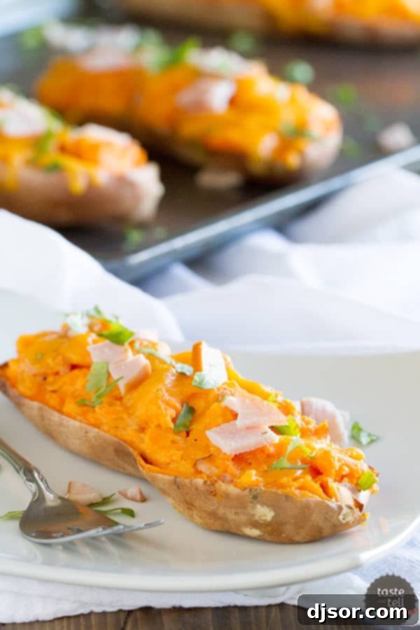 Cheesy, creamy Twice Baked Sweet Potatoes with Cheddar and Canadian Bacon – a delightful side or main dish.