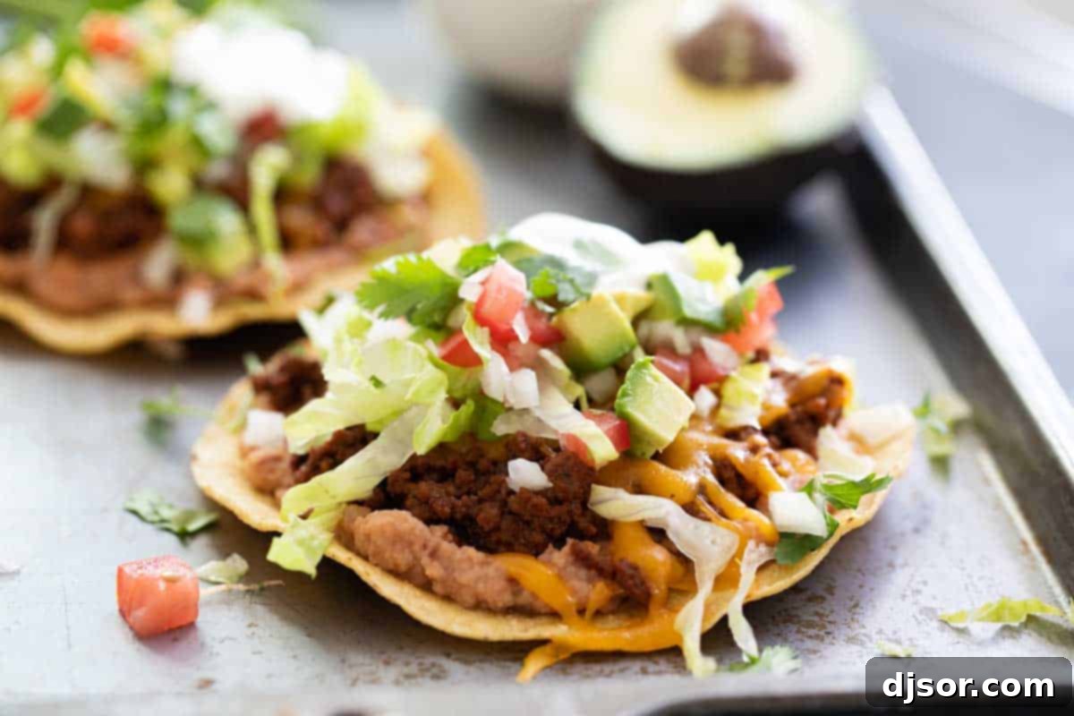 Crispy Beef Tostadas with Refried Beans and Toppings