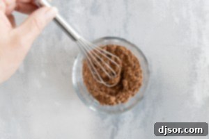 Mixing spices for beef tostadas.