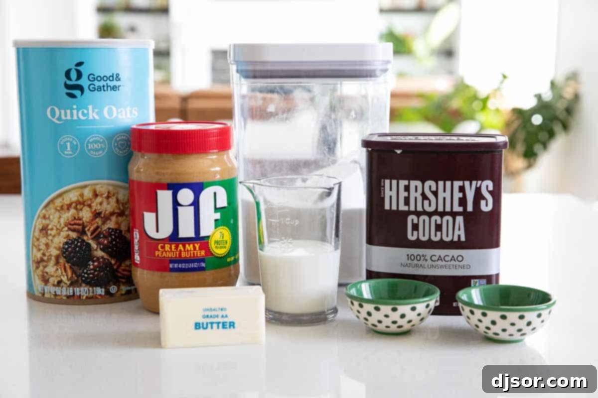 Essential ingredients for making classic no bake cookies laid out on a kitchen counter, including oats, sugar, cocoa powder, and peanut butter.