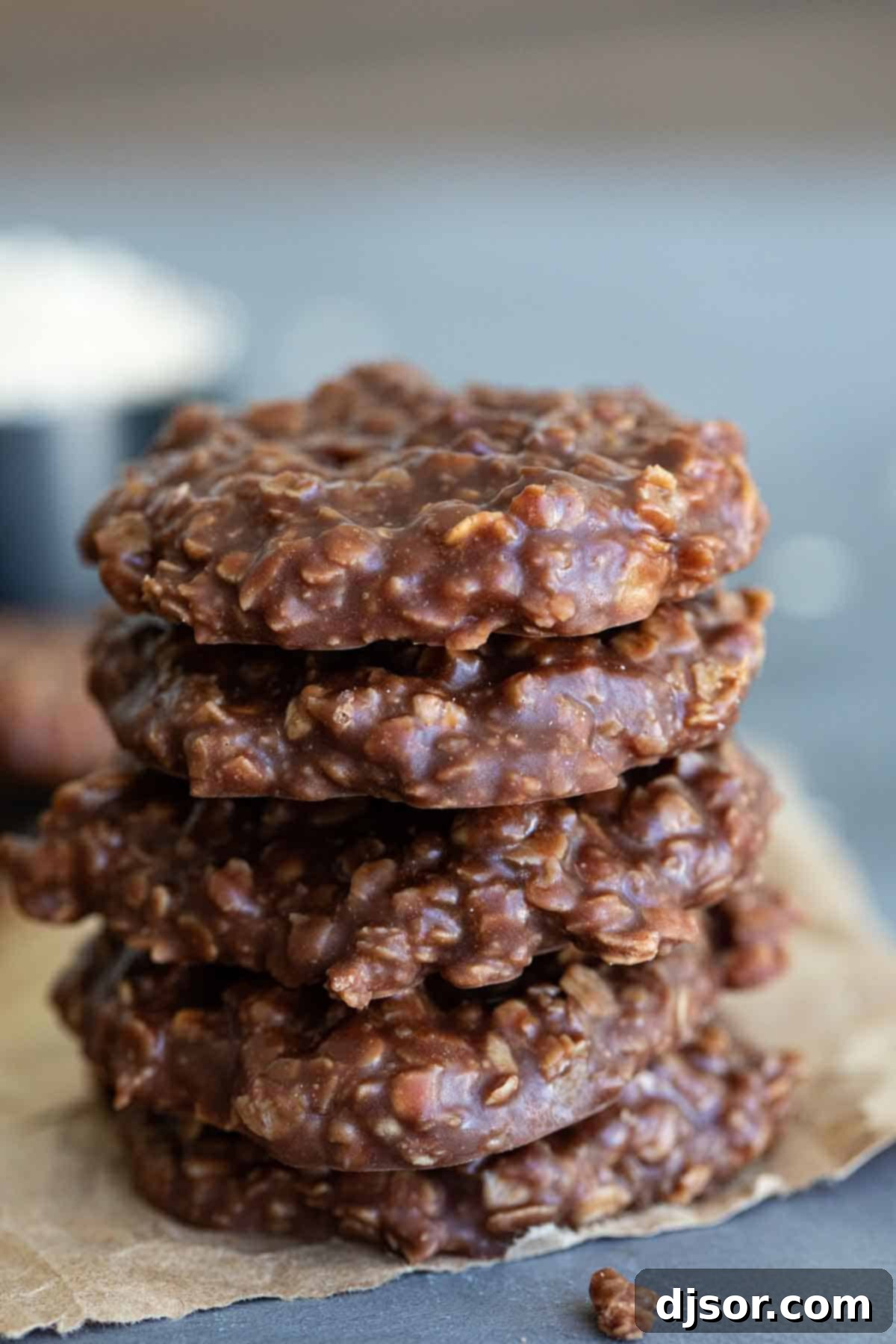 A beautifully arranged stack of finished chocolate peanut butter no bake cookies, perfectly set and ready to eat.