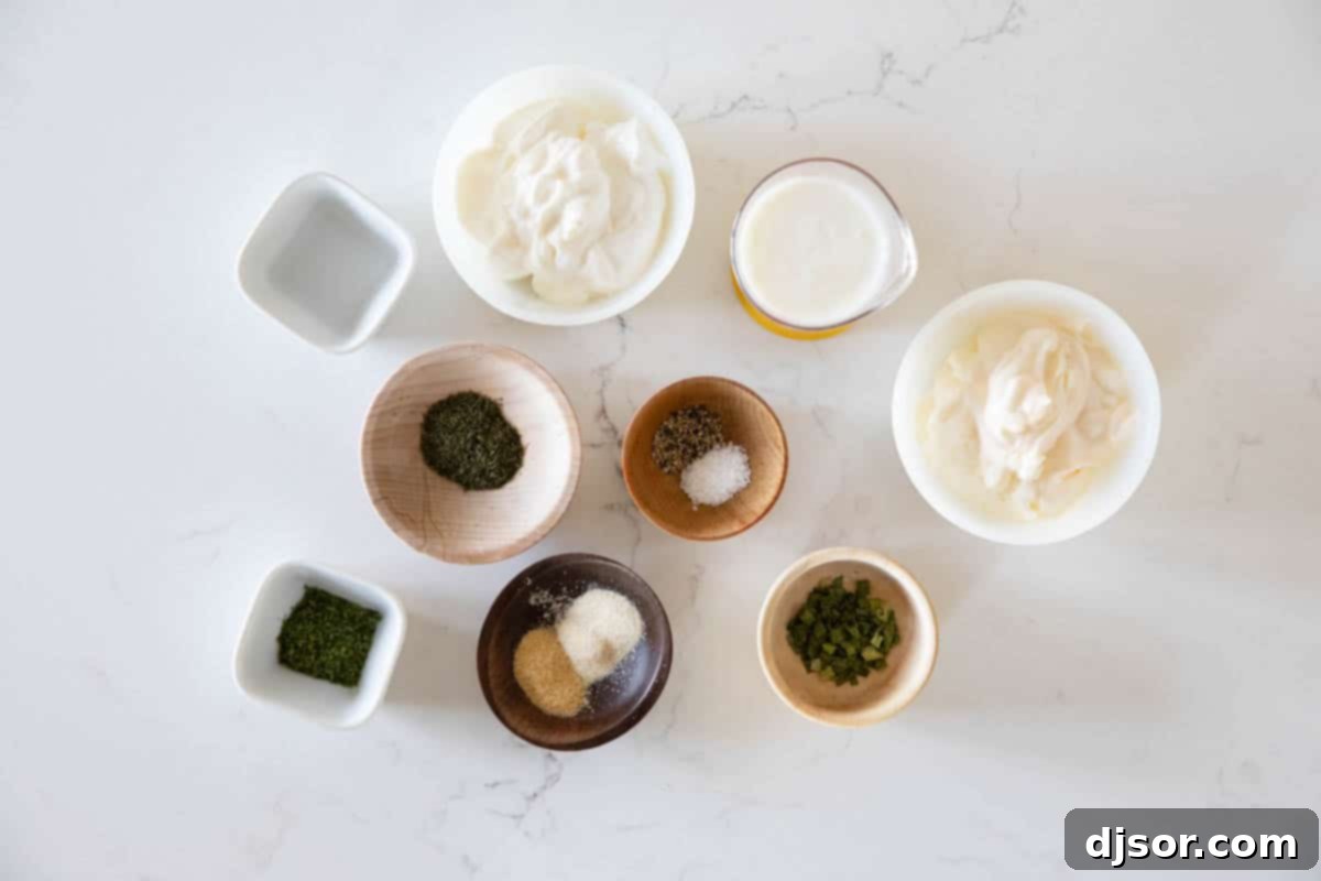 Various fresh ingredients laid out on a wooden board, ready to make homemade ranch dressing, including mayonnaise, sour cream, buttermilk, herbs, and spices.
