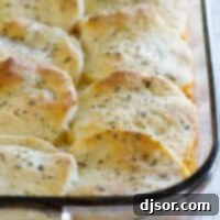 Italian Ground Beef Casserole with Biscuit Topping in a baking dish