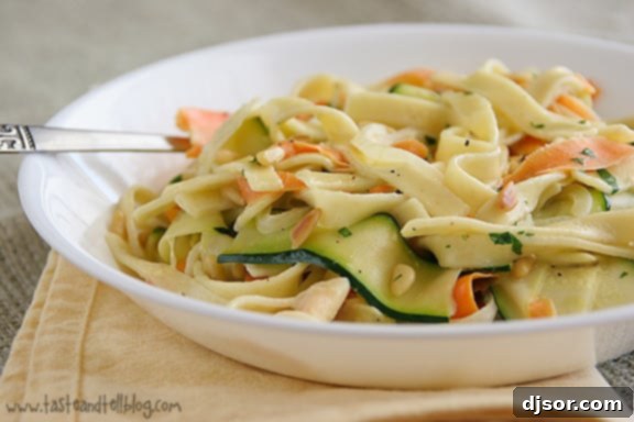 Bright Lemon Cream Pasta with Asparagus and Peas 9 Elegant Vegetable Ribbon Pasta with egg noodles, carrots, and zucchini in a light sauce