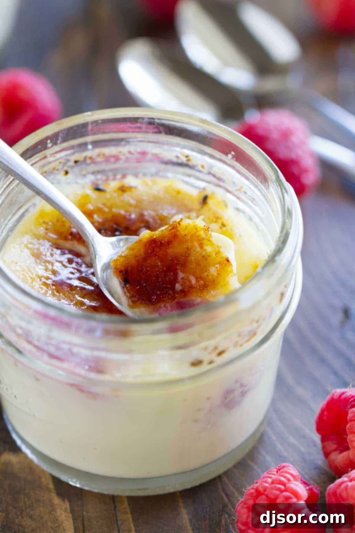 Heavenly Raspberry Creme Brulee 3 Breaking through the sugar on Raspberry Creme Brûlée.