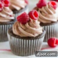 Decadent Chocolate Raspberry Cupcakes 2 Chocolate Raspberry Buttercream topped Chocolate cupcake with raspberry filling.
