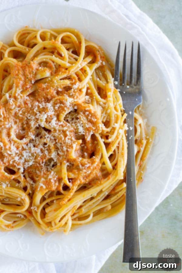 Savoring Patsy's Italian Cookbook Our Take on Roasted Red Pepper Pesto Linguine 4 Delicious and vibrant Roasted Red Pepper Pesto Linguine ready to be served.