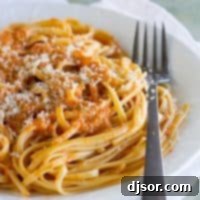 Savoring Patsy's Italian Cookbook Our Take on Roasted Red Pepper Pesto Linguine 6 Close-up of Roasted Red Pepper Pesto Linguine, a visually appealing vegetarian pasta.