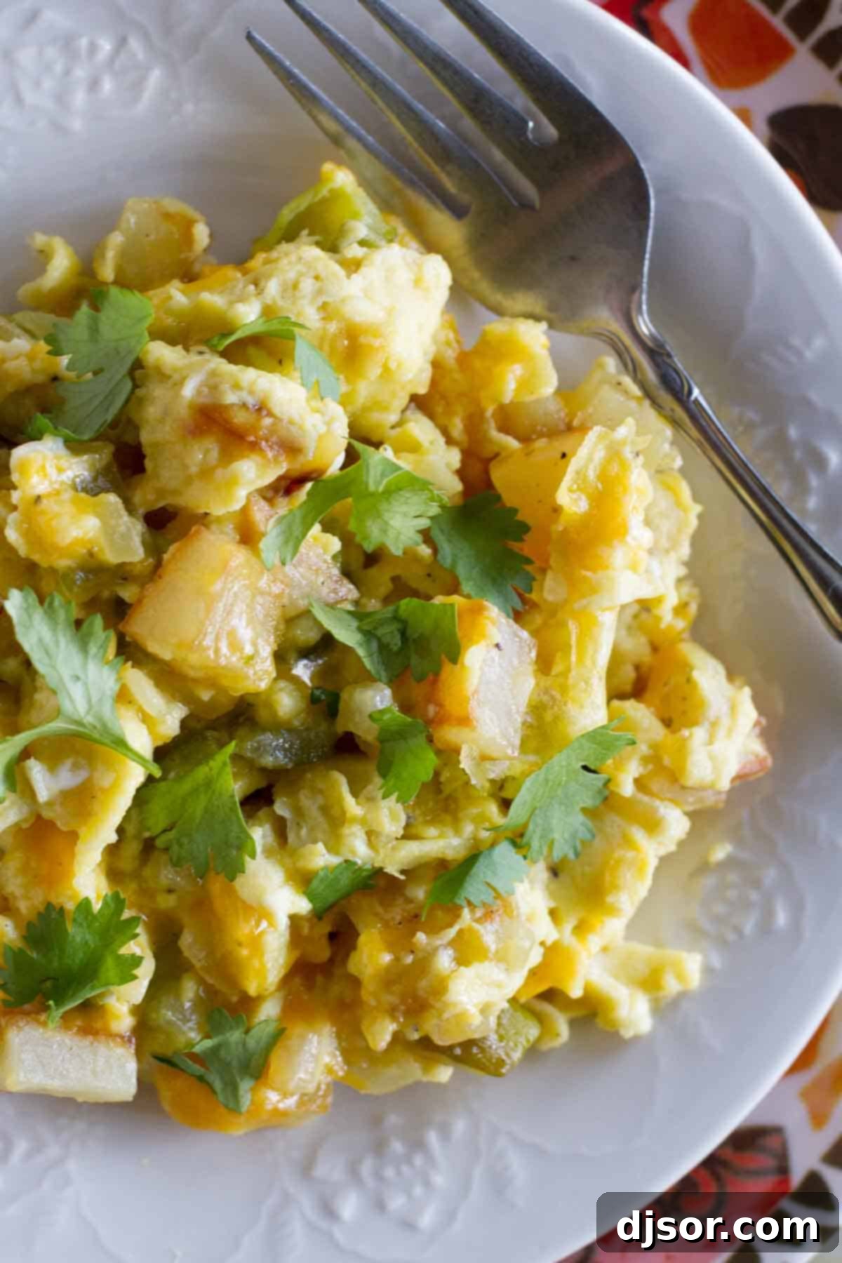 Close-up of Poblano Chile Scramble with perfectly cooked eggs, potatoes, and tender poblano chiles.