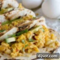 Ultimate Migas Tacos 2 Migas tacos with avocado on flour tortillas