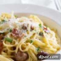 Savory Sausage Carbonara 4 A bowl of Sausage Carbonara Pasta, garnished with fresh parsley.