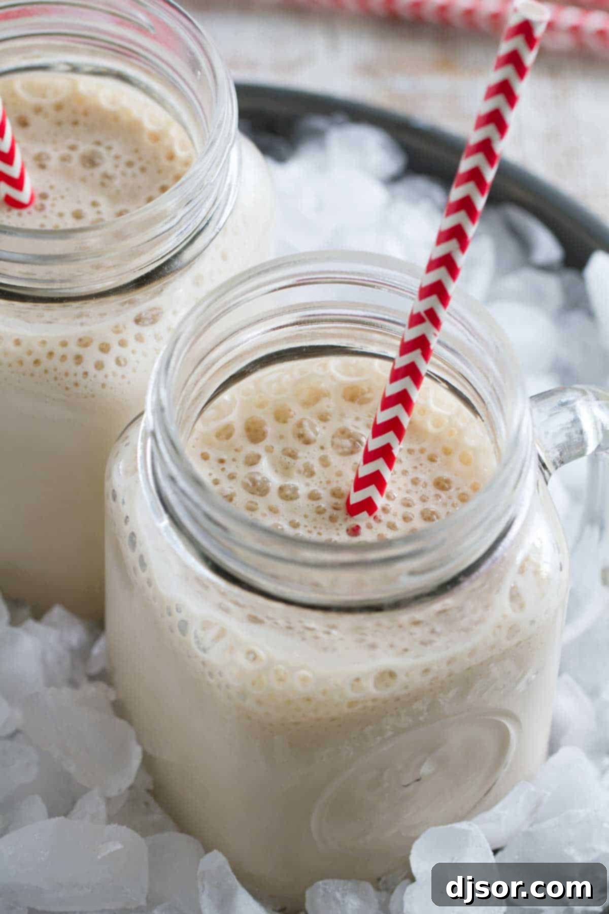 Creamy Root Beer Float Smoothie 3 Two root beer float smoothies in ice.