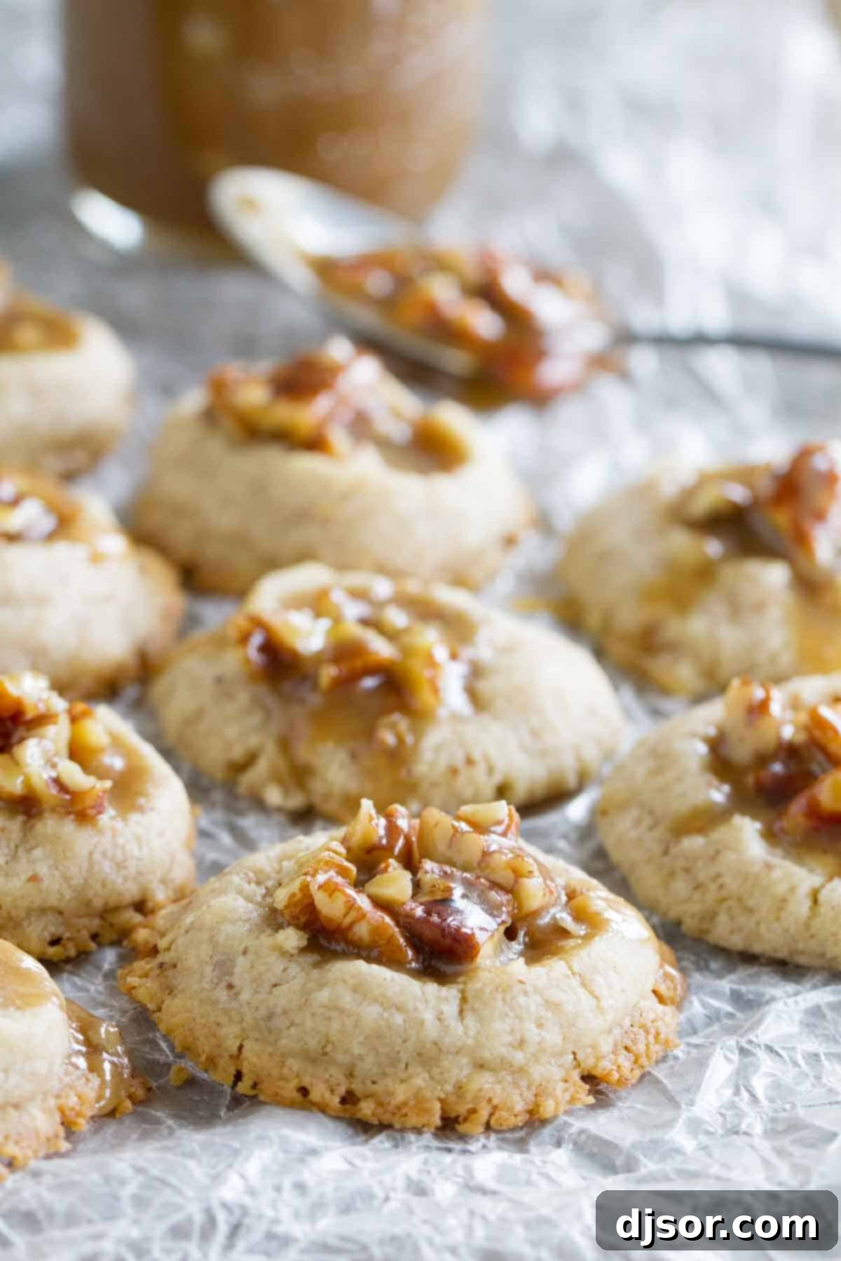 Pecan Praline Thumbprints on a piece of parchment