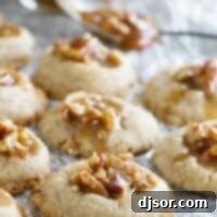 Pecan Praline Thumbprints on a piece of parchment
