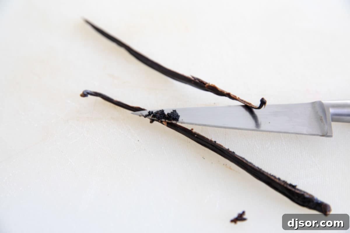 Scraping seeds from a vanilla bean pod