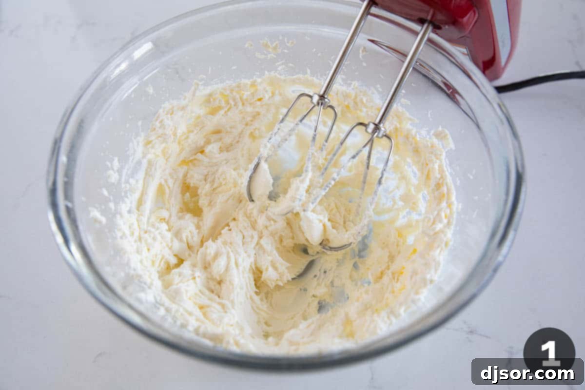 Creamy White Cheese Dip 4 Beating cream cheese to soften.