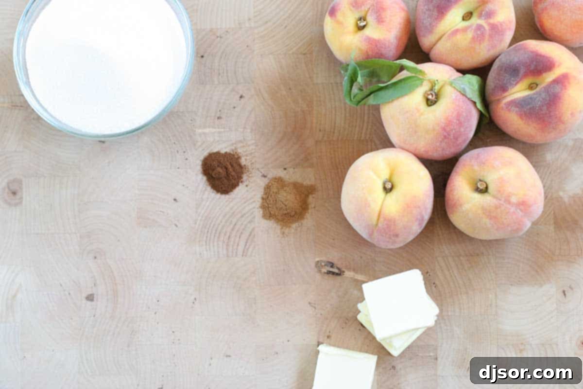 Close-up of fresh ingredients laid out for making Crock Pot Peaches, including sliced peaches, sugar, cinnamon, cloves, and butter.