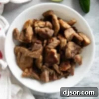 Slow-Roasted Crispy Pork Perfection 9 Bowl filled with pieces of Pork Carnitas.