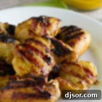Grilled Brown Sugar Mustard Chicken stacked on a plate