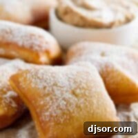 Cinnamon Honey Butter German Scones 2 fried German scones sprinkled with powdered sugar