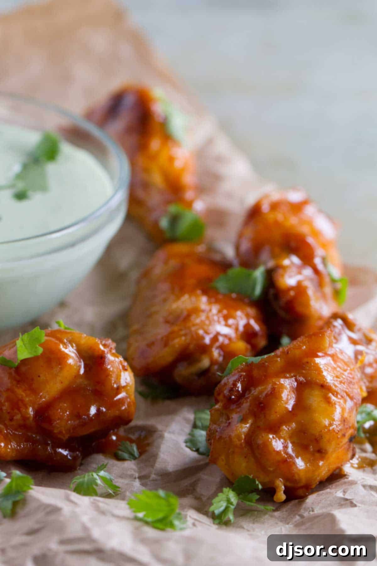 Enchilada Chicken Wings with cilantro dipping sauce.