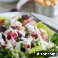 Vibrant Greek Quinoa Bowl 5 Bowl filled with Greek Quinoa Salad with homemade dressing.